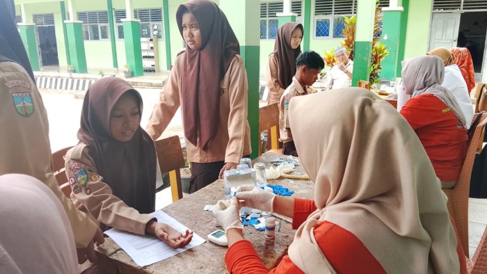 Siswa-Siswi MTsN 7 Bungo Antusias Ikuti Tes Kesehatan Gratis (CKG) Bersama UPT Puskesmas Tanah Tumbuh