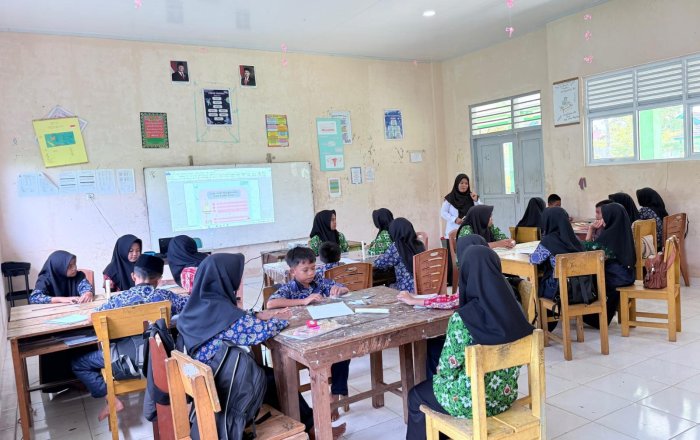 Ibu Rubiah, S.Pd, Guru IPA MTsN 7 Bungo, Sukses Jalani UKIN Program PPG dengan Materi Perubahan Fisika dan Kimia