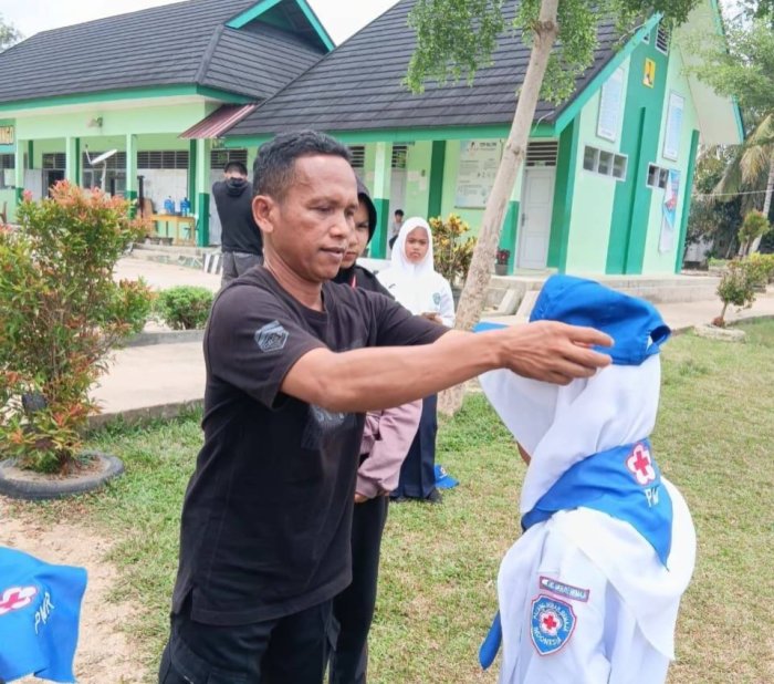 Harap dan Haru Warnai Pengukuhan Anggota PMR Madya MTsN 7 Bungo